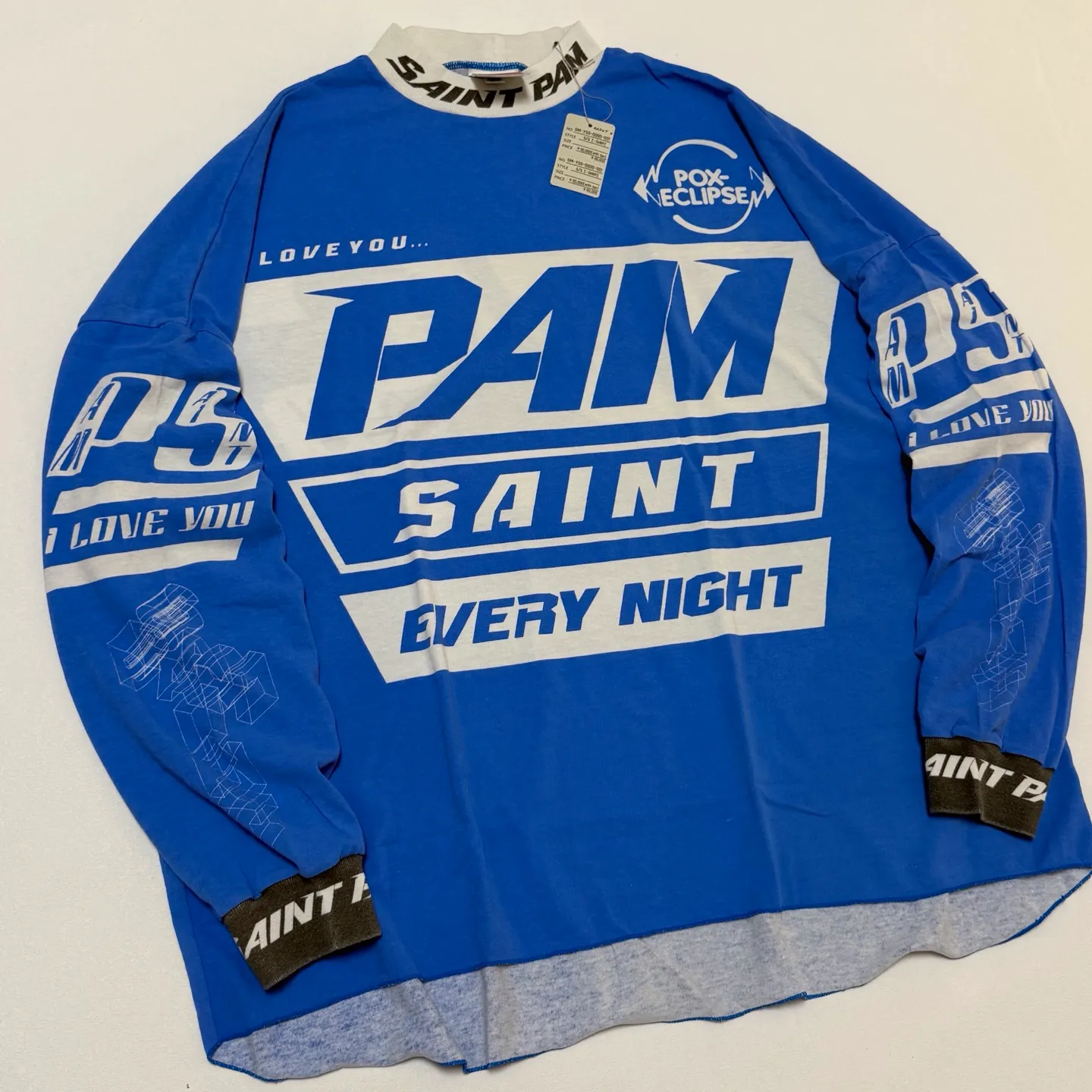SAINT Mxxxxx Make the printing look distressed and white. Correct accessories. Customized co-branded model with P.A.M. wash mark.
